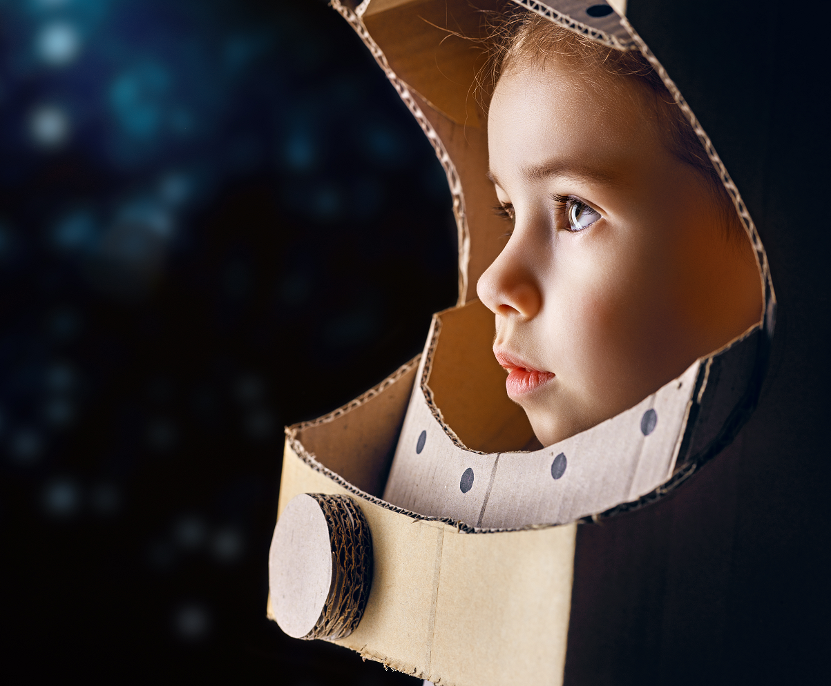 Junior astronomer wondering about the vast universe